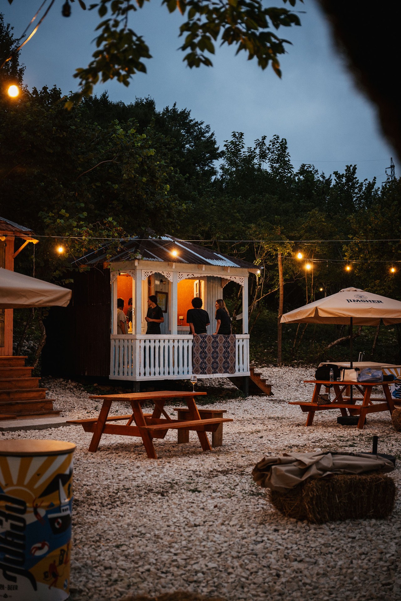 Illuminated bar pavilion in the evening